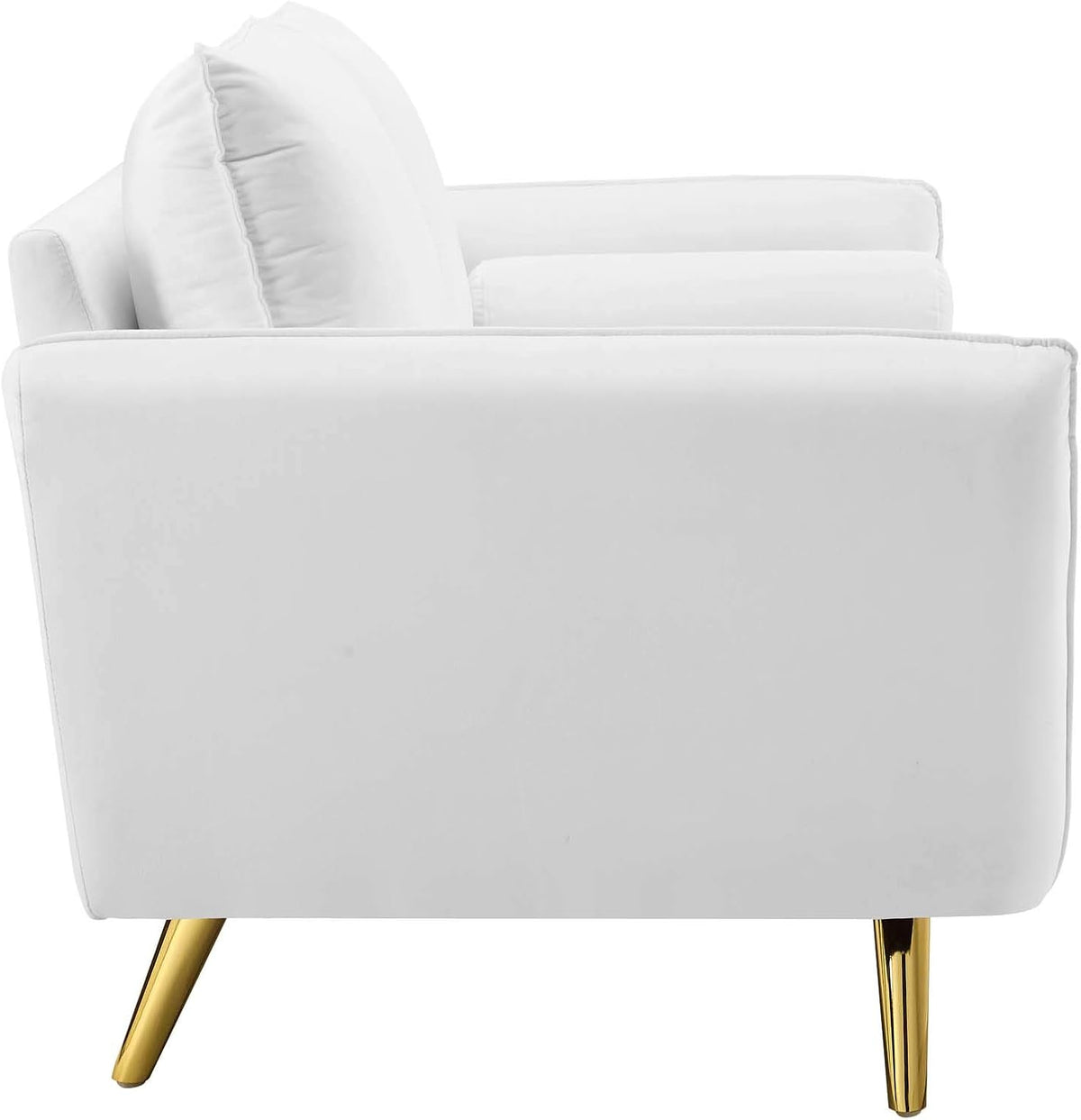 Close-up of gold splayed legs on white loveseat