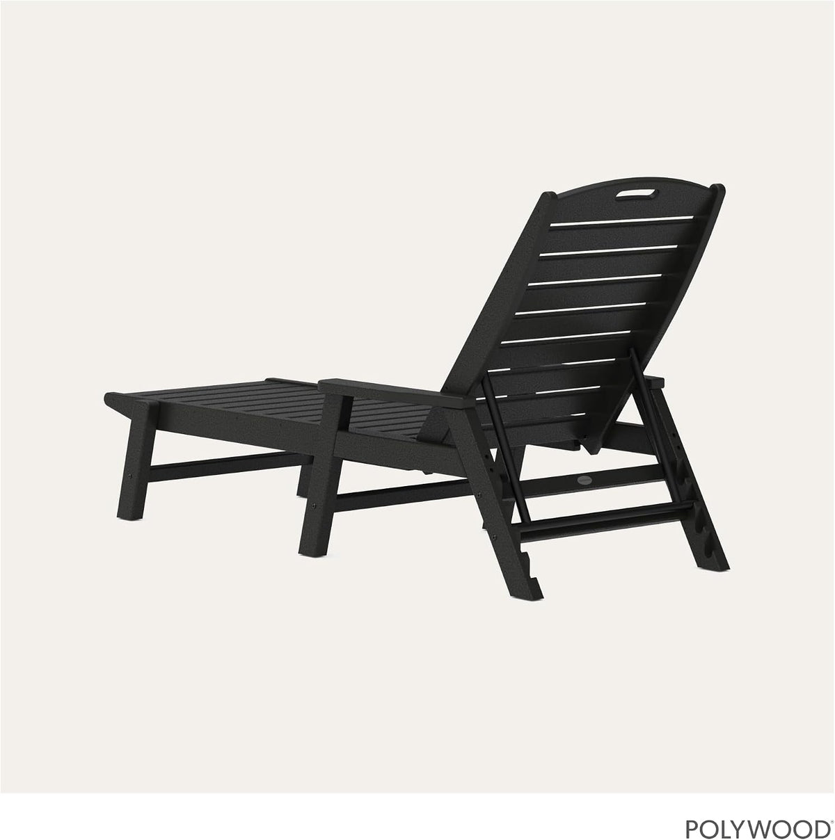 Close-up of black HDPE slats and arm detail on outdoor chaise lounge