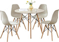 Scandinavian round dining set with sand tabletop and four molded plastic chairs on beech wood legs