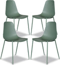 Set of 4 pistachio green molded plastic dining chairs with matte black metal legs