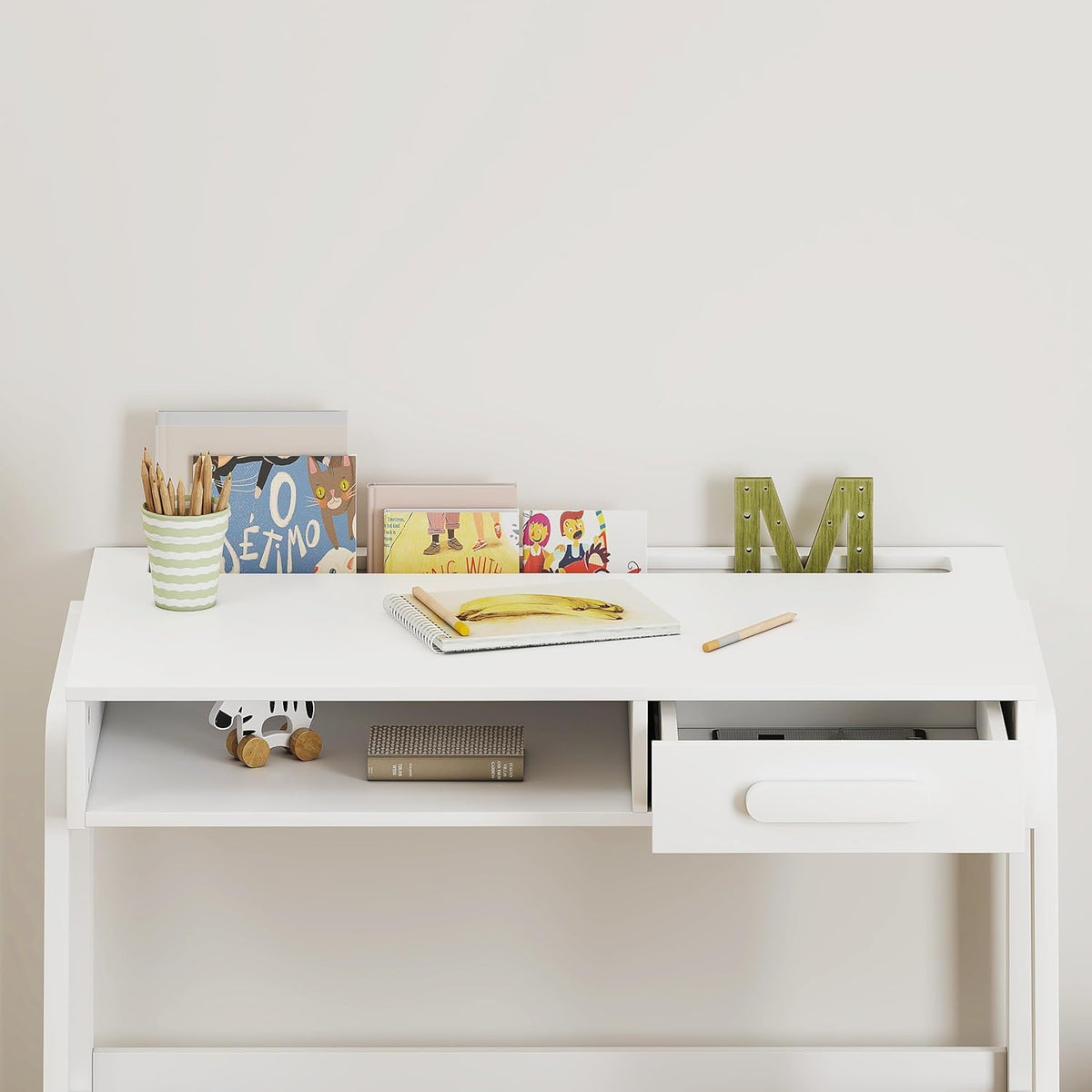 Open storage cube beneath the desk holding fabric bins