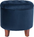 Navy velvet button-tufted storage ottoman, front view