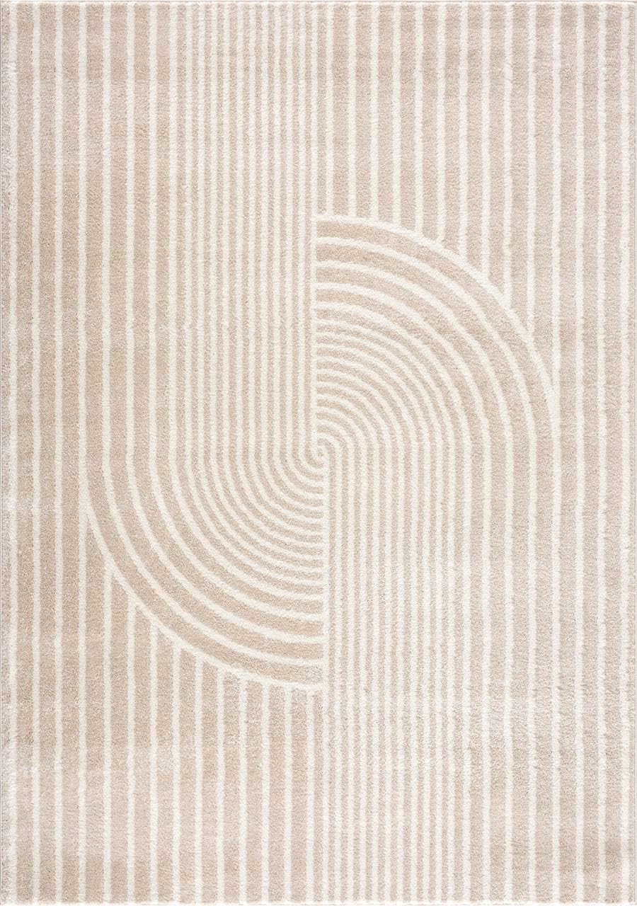 Modern arch pattern area rug, cream, styled in a living room