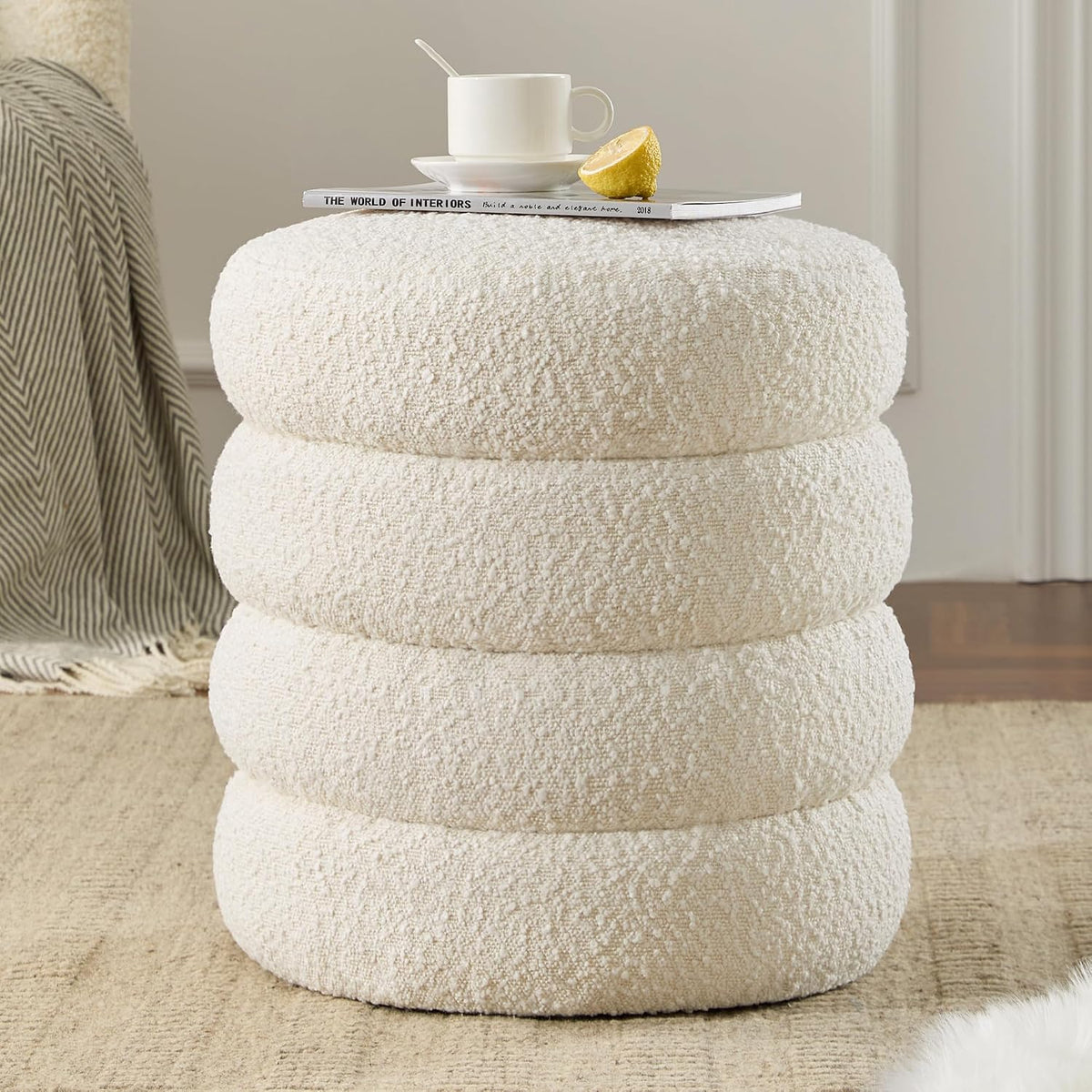 White boucle-texture storage ottoman, front view