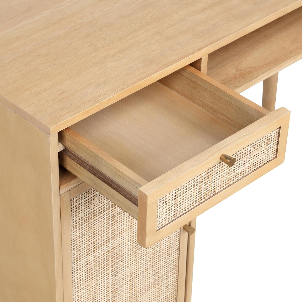 Side view of the rattan desk showing its depth and drawer