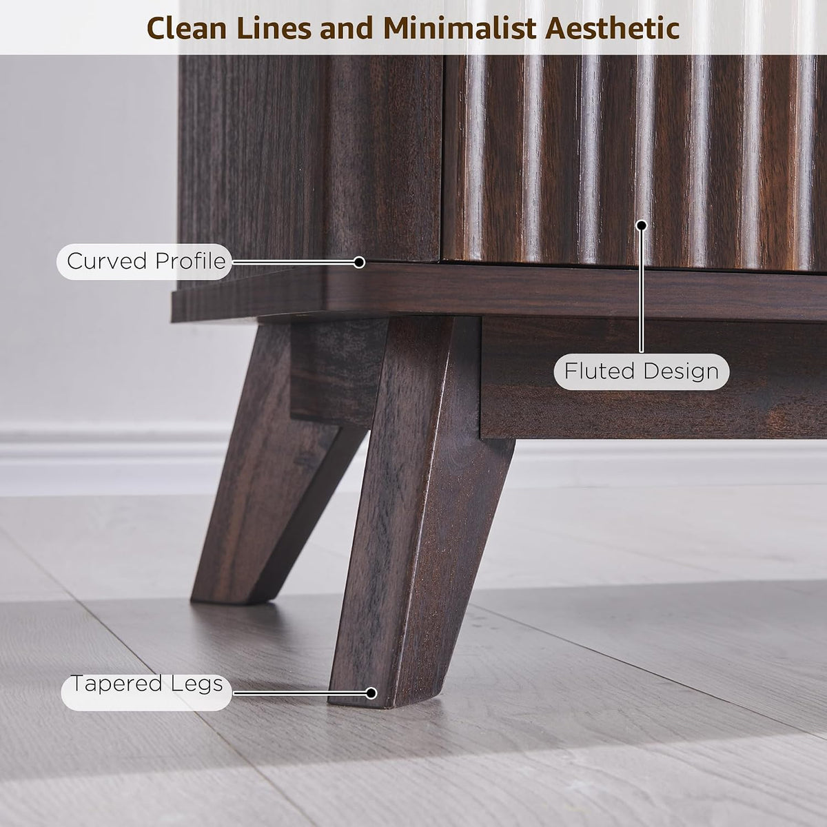 Fluted dark walnut TV stand styled in a living room with a mounted TV