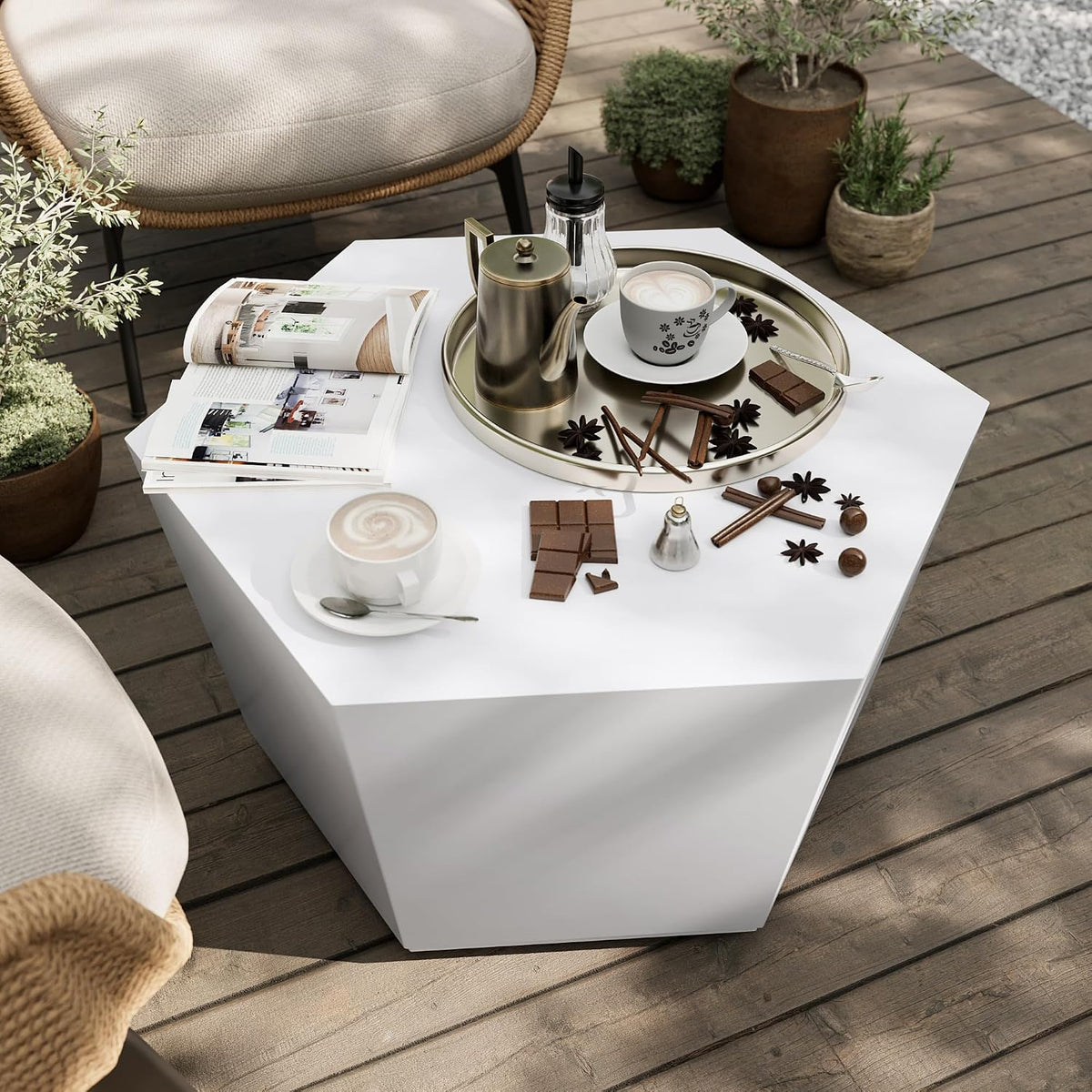 Round travertine-look outdoor coffee table, off-white, angled view showing texture