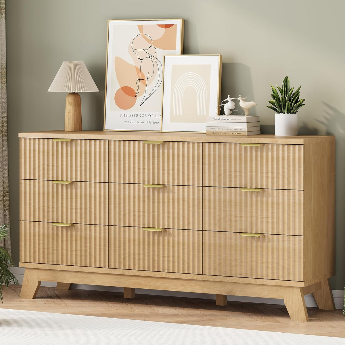 Close-up of fluted wave-textured drawer front and metal pull handle on natural oak dresser