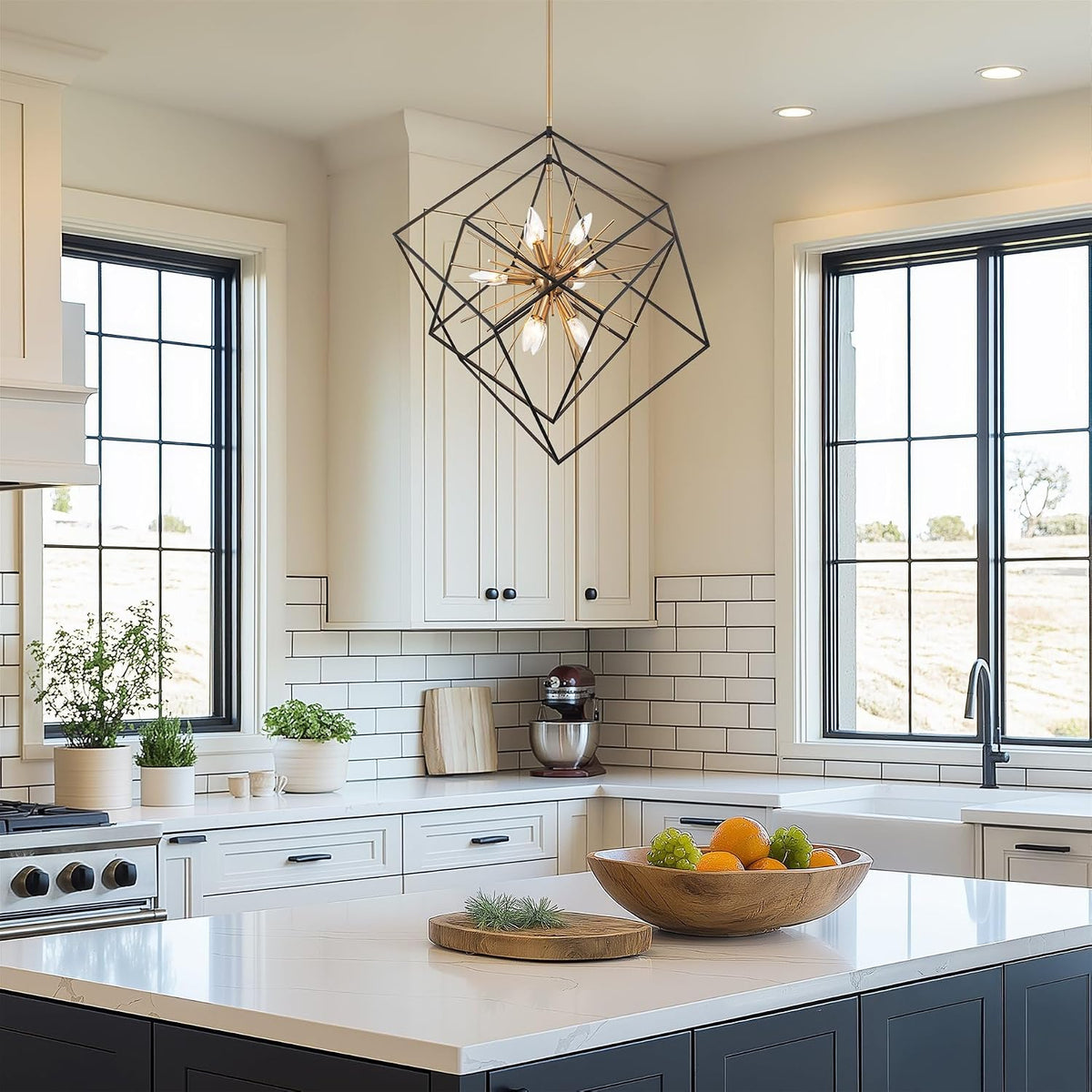 Kira Home chandelier styled over a kitchen island