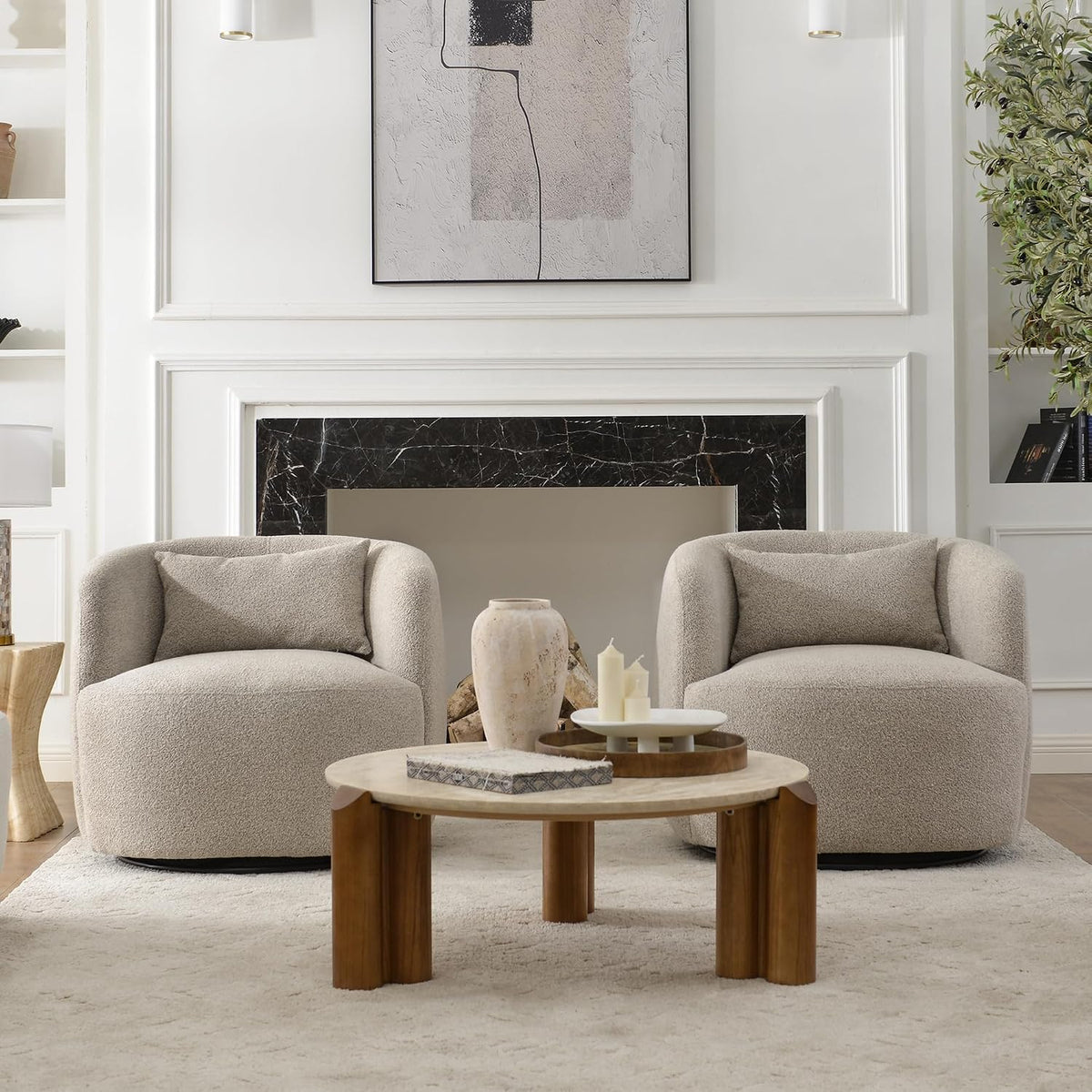 Boucle swivel barrel chairs styled in a living room