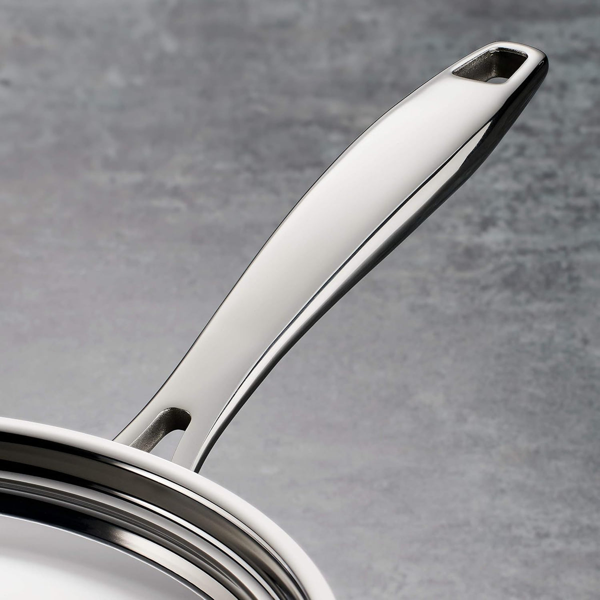 Tramontina cookware set riveted handle close-up detail