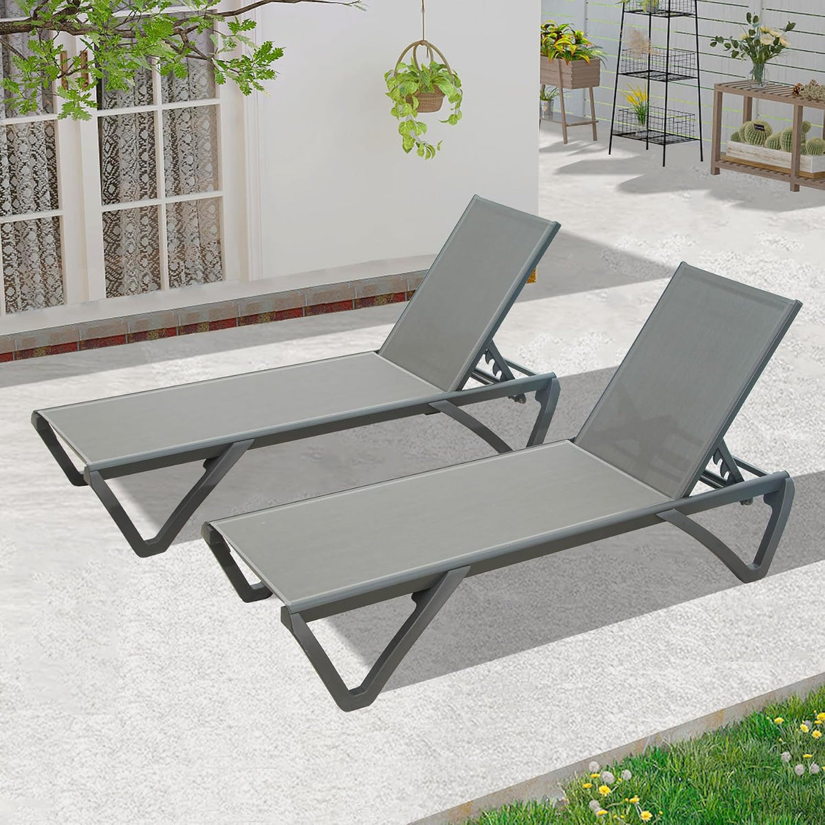 Grey aluminum sling chaise lounge, rear view