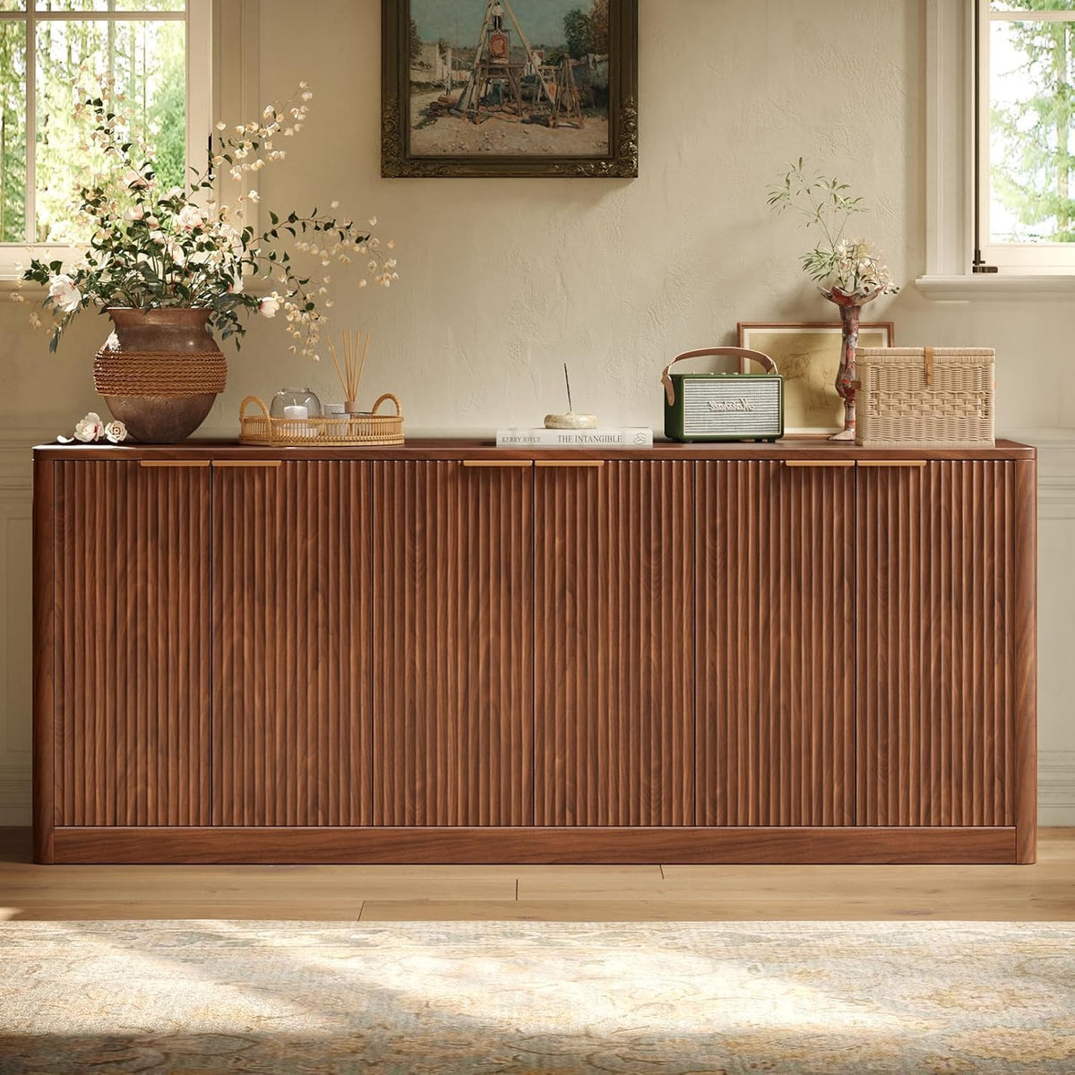 Fluted walnut buffet cabinet, open doors showing interior storage