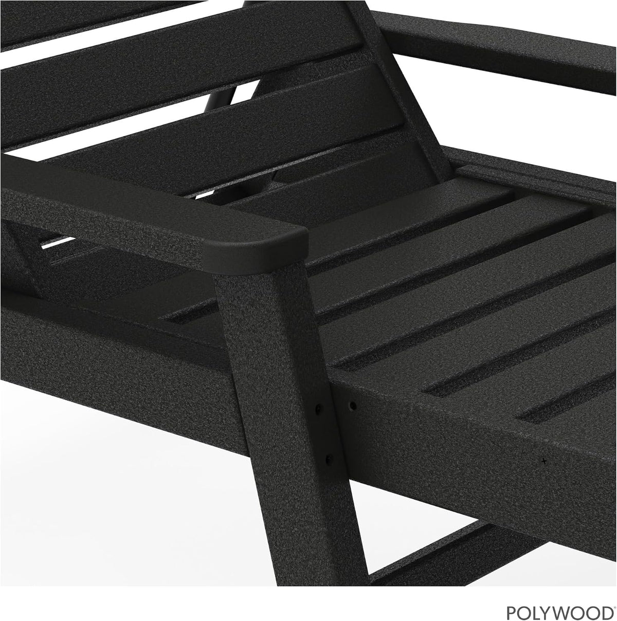 Black HDPE outdoor chaise lounge styled poolside