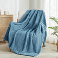 Exclusivo Mezcla slate blue waffle fleece throw blanket folded, showing texture