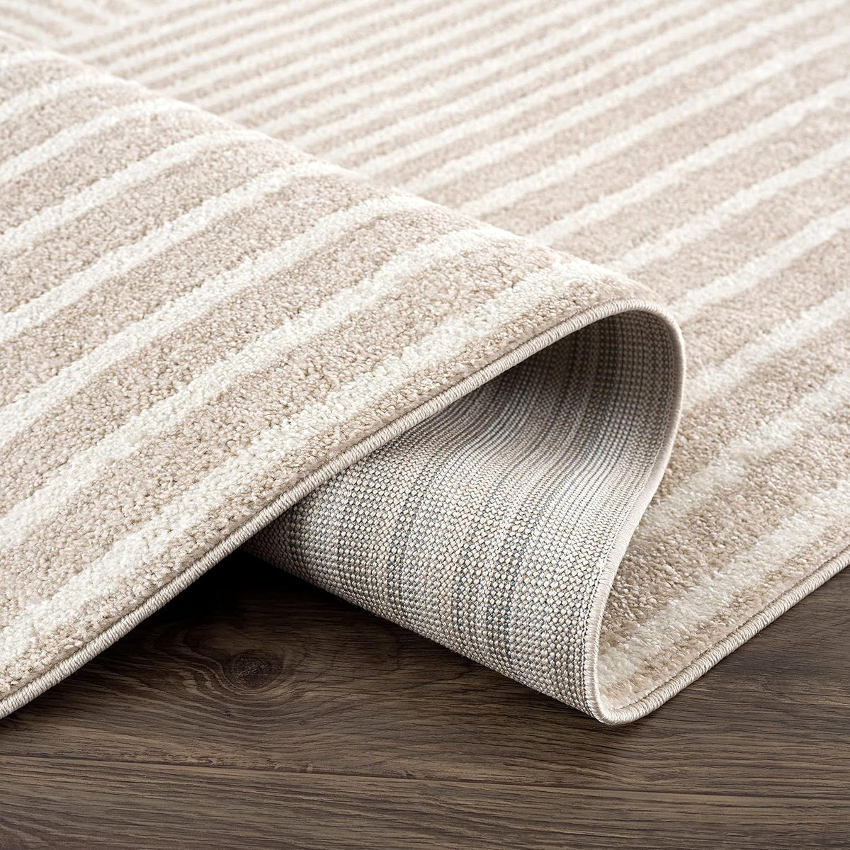 Modern arch pattern area rug, cream, full room view