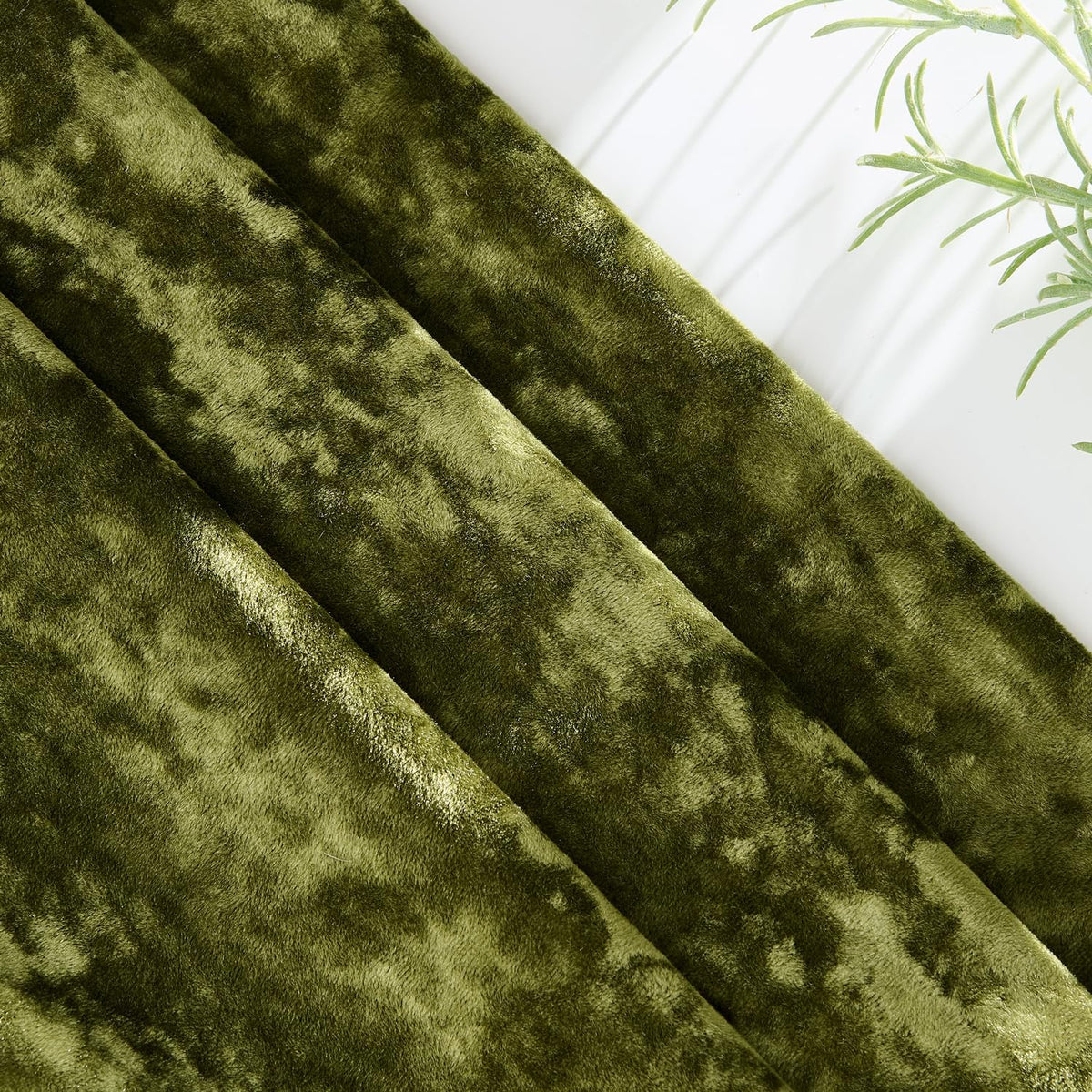 MIULEE olive green velvet pillow covers styled on a sofa